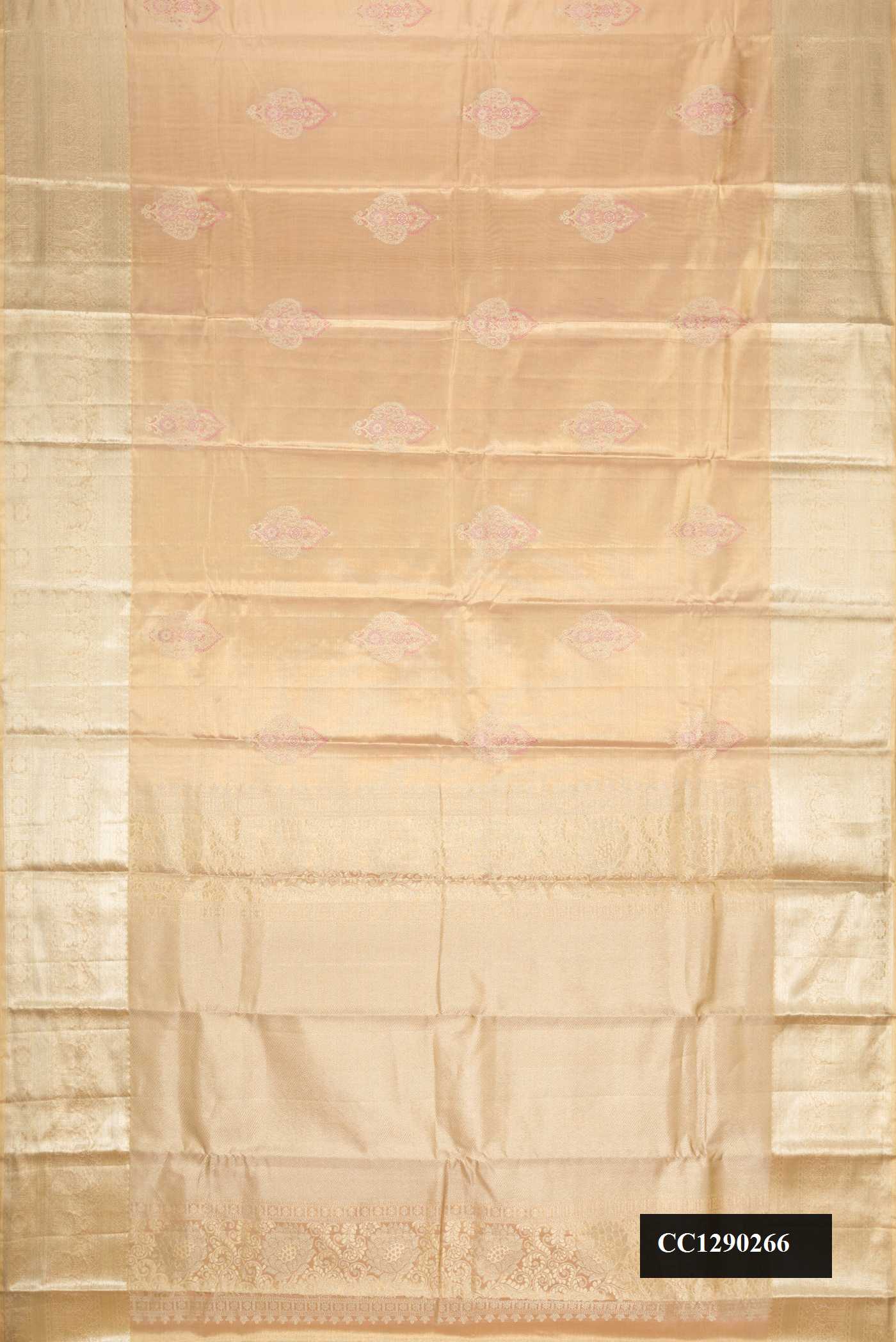 Peach Dual Tone Kanchipuram Tissue Silk Saree with Zari Brocade on the body and Zari Border.  displayed on a mannequin