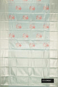 Light Blue Dual Tone Kanchipuram Tissue Silk Saree with Zari Brocade on the body and Zari Border.  displayed on a mannequin
