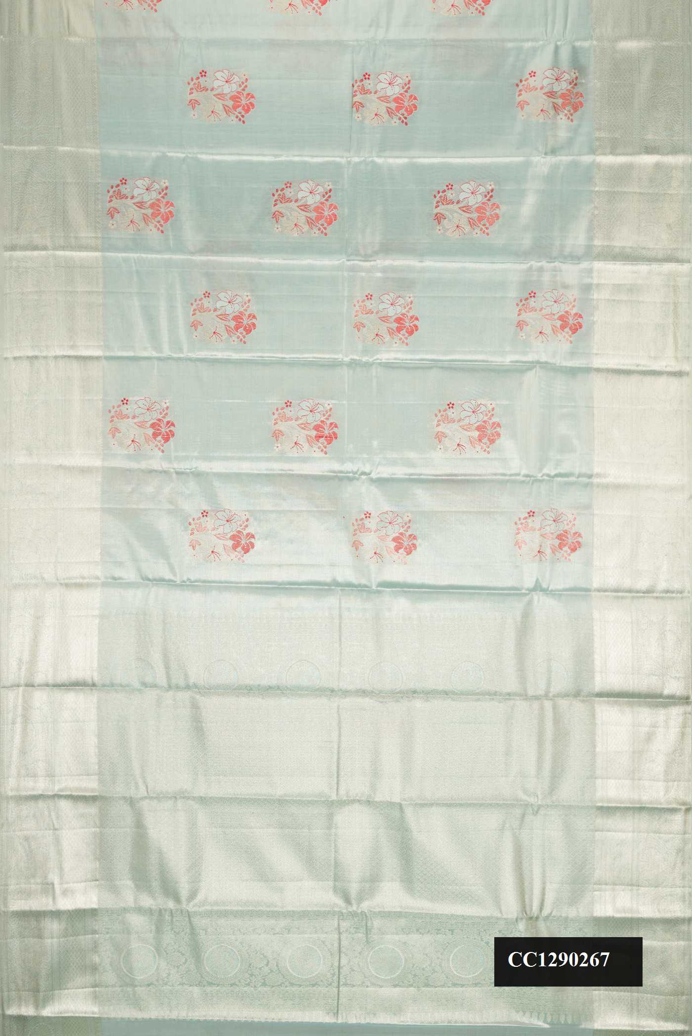 Light Blue Dual Tone Kanchipuram Tissue Silk Saree with Zari Brocade on the body and Zari Border.  displayed on a mannequin