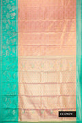 Golden Peach Dual Tone Kanchipuram Tissue Silk Saree with Zari Brocade on the body and Zari Border.  displayed on a mannequin