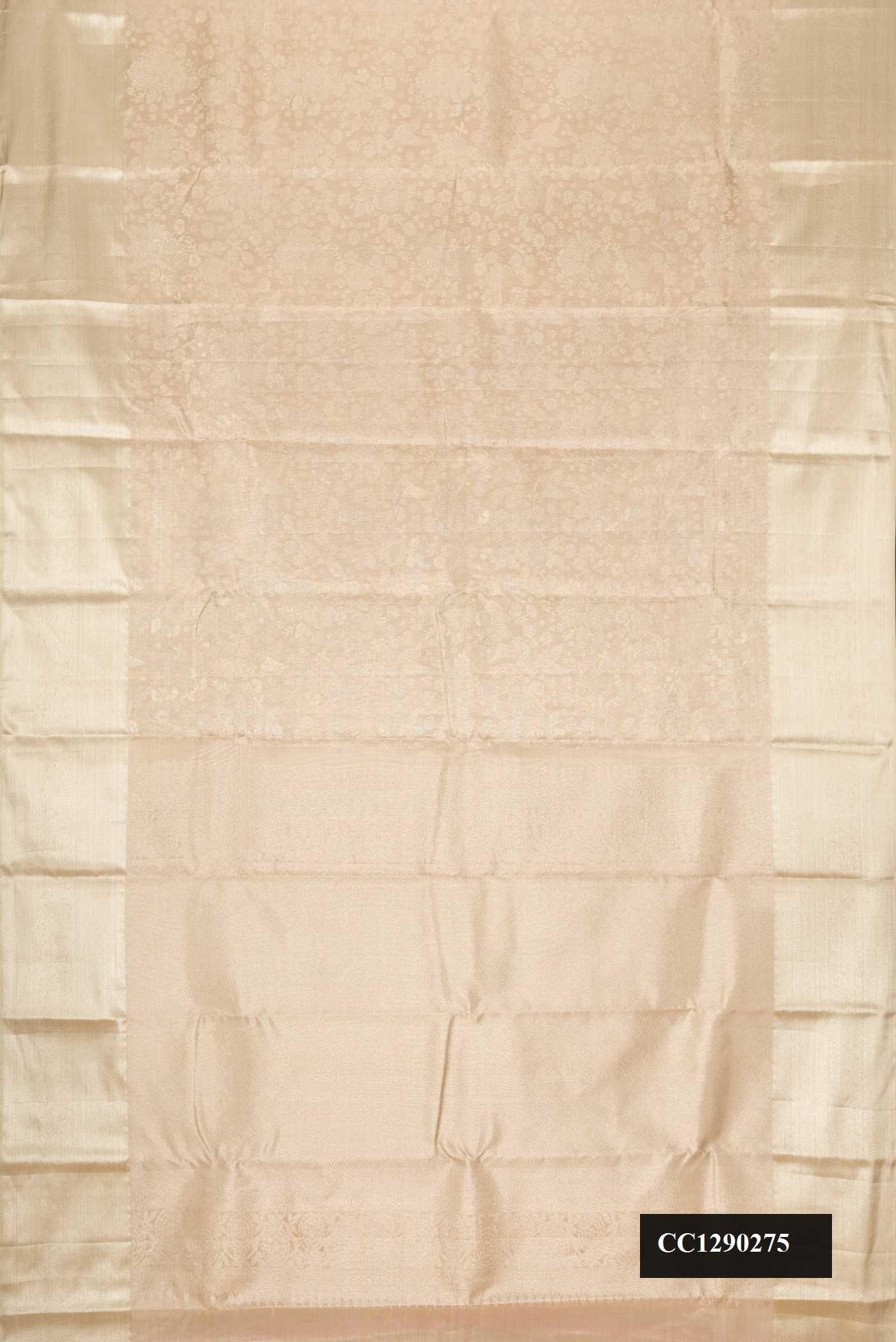 Beige Dual Tone Kanchipuram Tissue Silk Saree with Zari Brocade on the body and Zari Border.  displayed on a mannequin