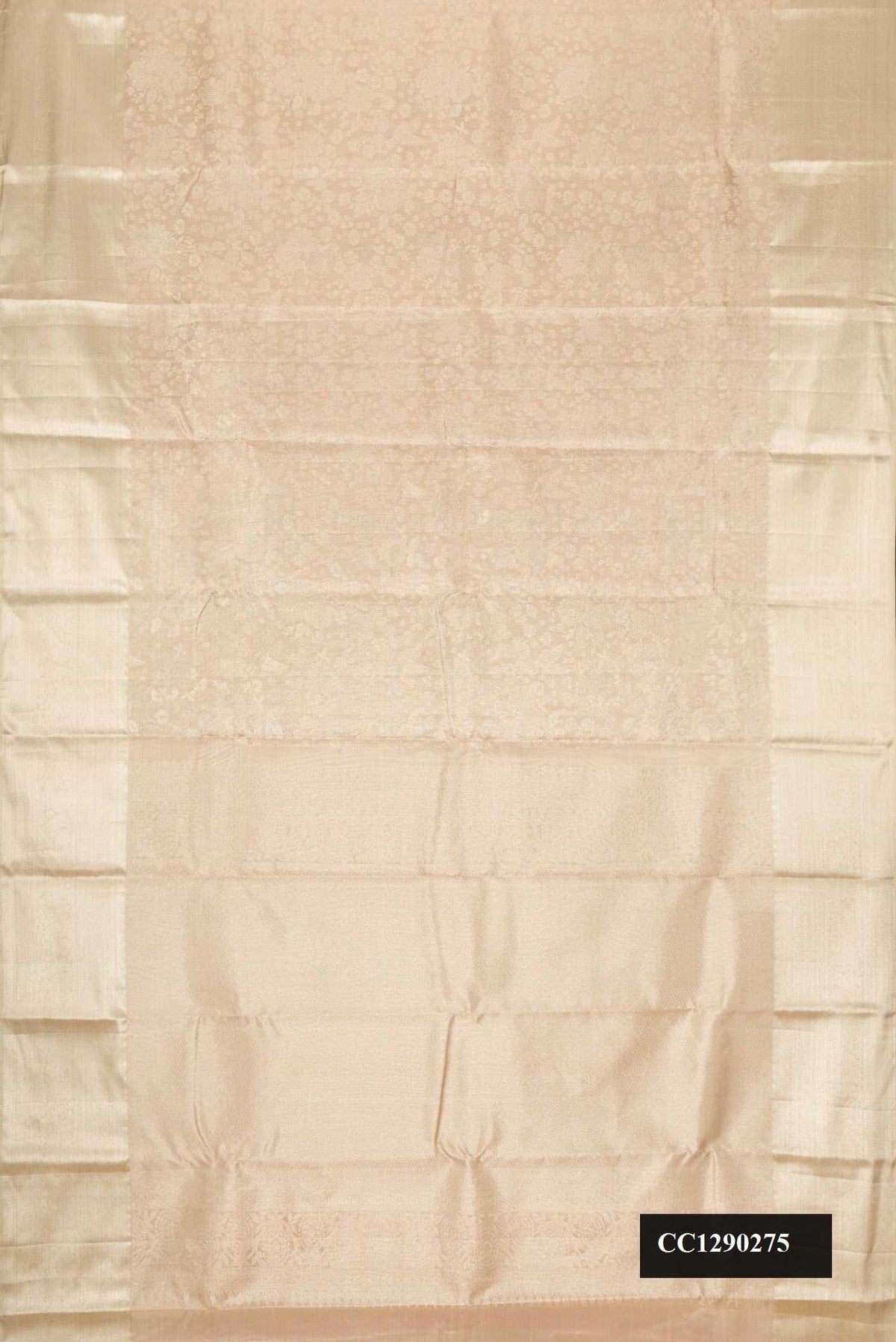 Beige Dual Tone Kanchipuram Tissue Silk Saree with Zari Brocade on the body and Zari Border.  displayed on a mannequin