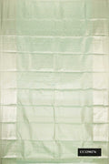 Green Dual Tone Kanchipuram Tissue Silk Saree with Zari Brocade on the body and Zari Border.  displayed on a mannequin