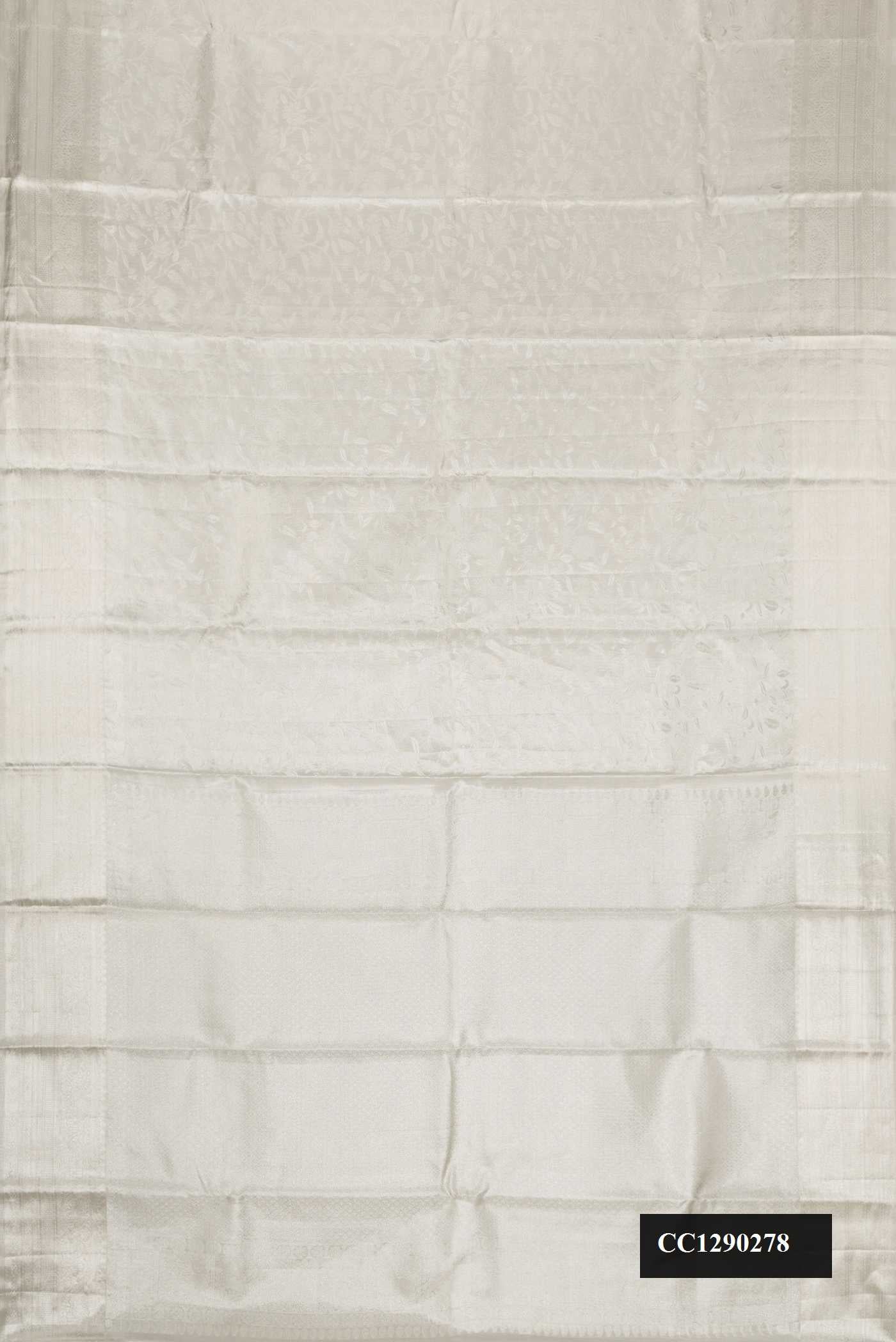 Silver Dual Tone Kanchipuram Tissue Silk Saree with Zari Brocade on the body and Zari Border.  displayed on a mannequin