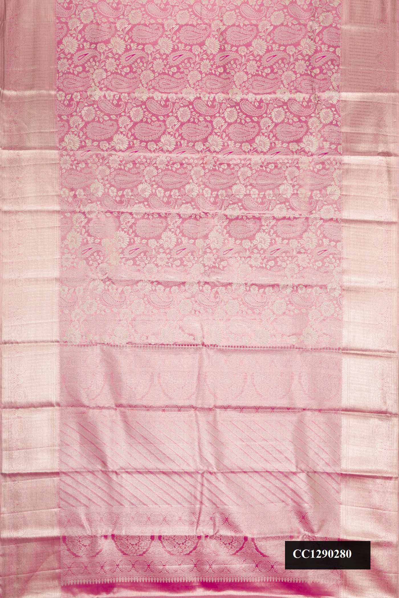 Pink Dual Tone Kanchipuram Tissue Silk Saree with Zari Brocade on the body and Zari Border.  displayed on a mannequin