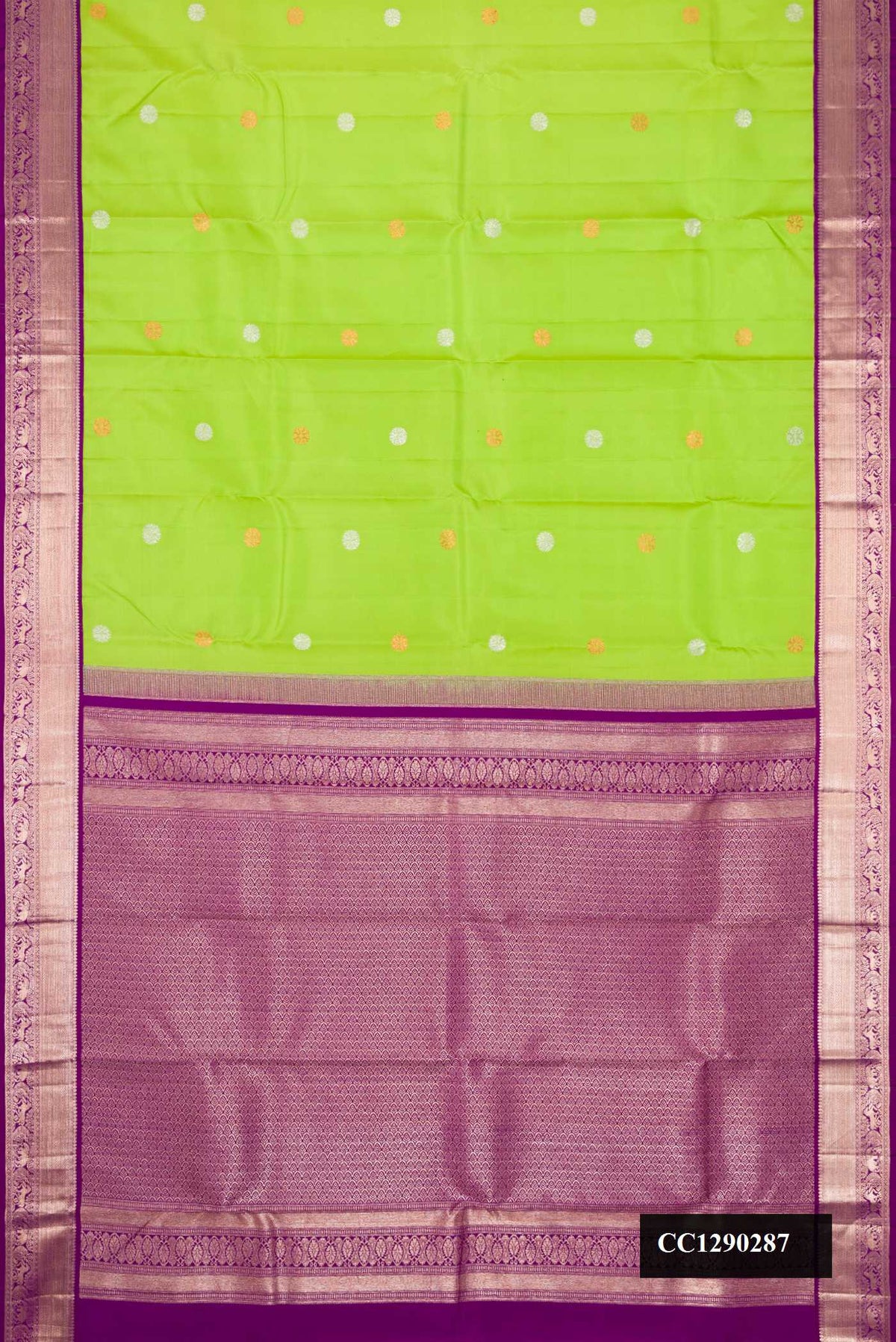 Parrot Green Dual Tone Kanchipuram Silk Saree with Zari Butta on the body and Zari Border.  displayed on a mannequin