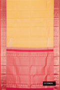 Yellow Dual Tone Kanchipuram Silk Saree with Zari Butta on the body and Zari Border.  displayed on a mannequin