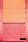 Golden Peach Dual Tone Kanchipuram Silk Saree with Zari Butta on the body and Zari Border.  displayed on a mannequin