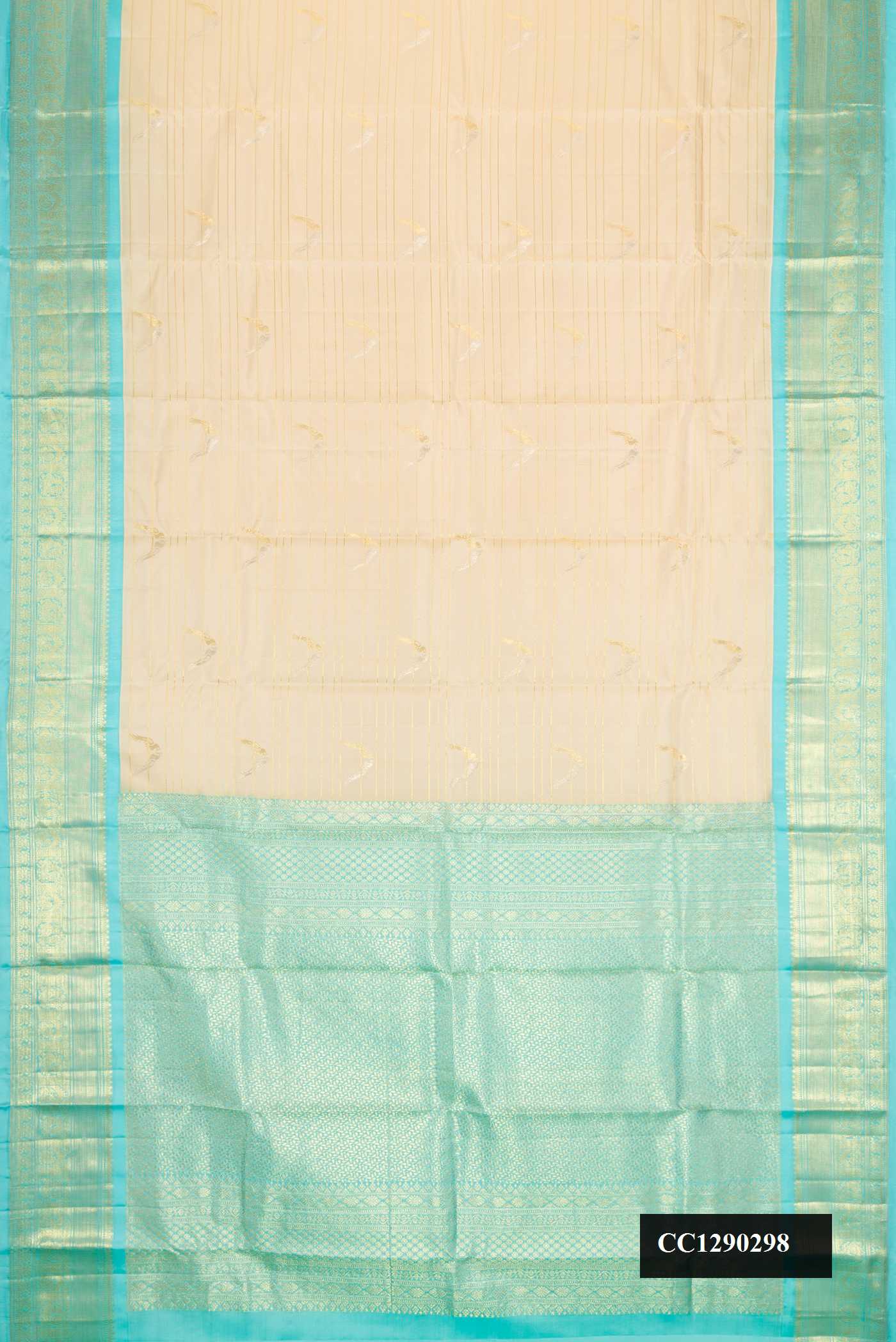Sandal Dual Tone Kanchipuram Silk Saree with Zari Butta on the body and Zari Border.  displayed on a mannequin