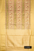 Brown Dual Tone Kanchipuram Tissue Silk Saree with Zari Brocade on the body and Zari Border.  displayed on a mannequin