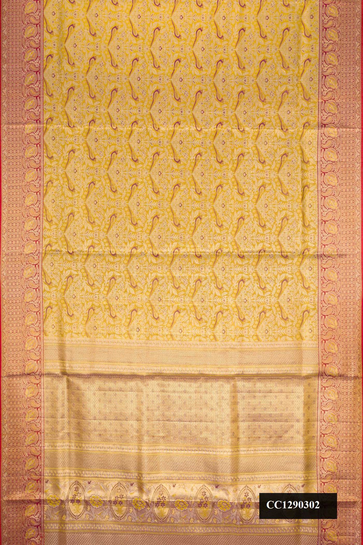 Gold Dual Tone Kanchipuram Silk Saree with Zari Brocade on the body and Zari Border.  displayed on a mannequin