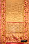 Gold Dual Tone Kanchipuram Tissue Silk Saree with Zari Brocade on the body and Zari Border.  displayed on a mannequin