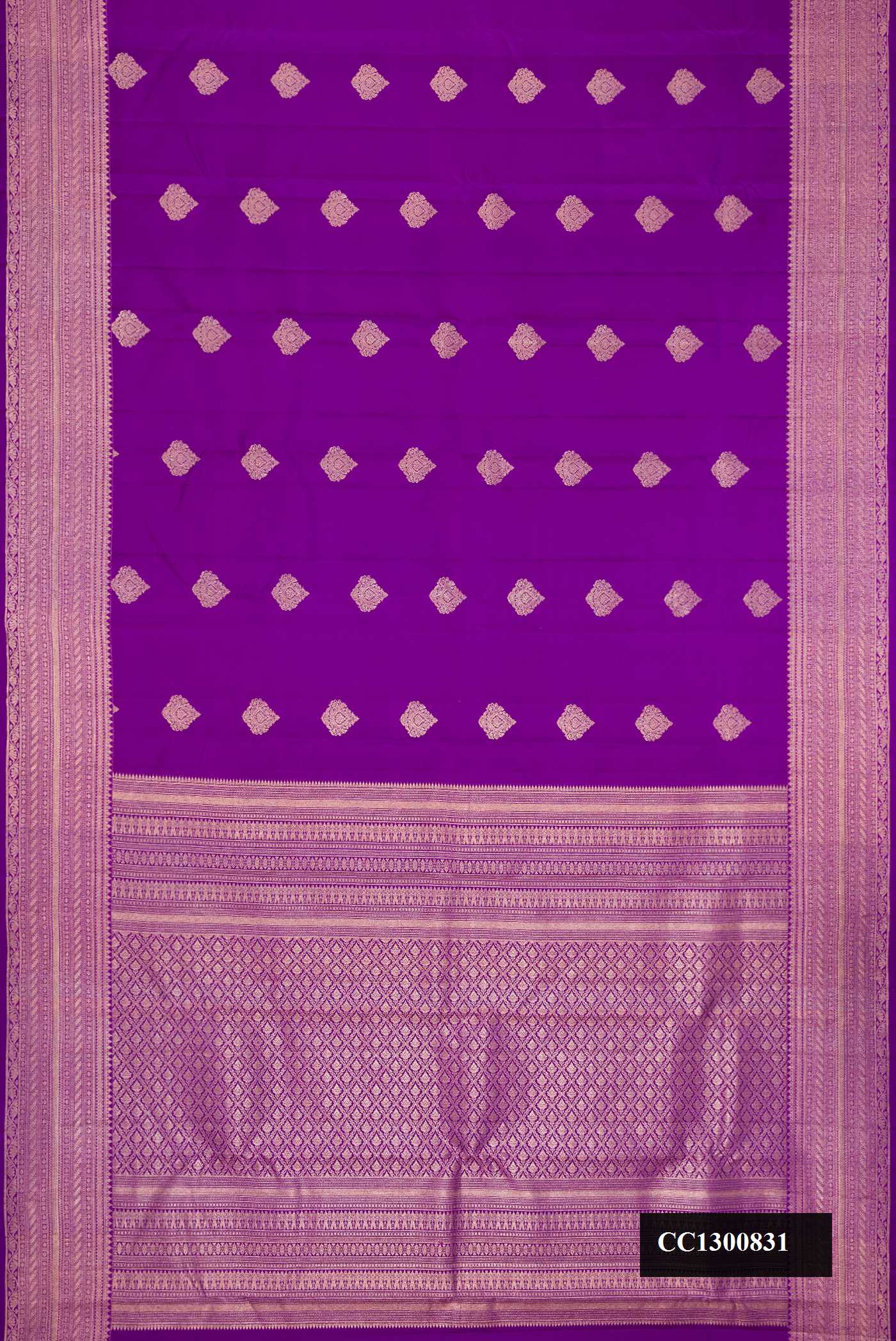 Violet Dual Tone Kanchipuram Silk Saree with Zari Butta on the body and Zari Border.  displayed on a mannequin