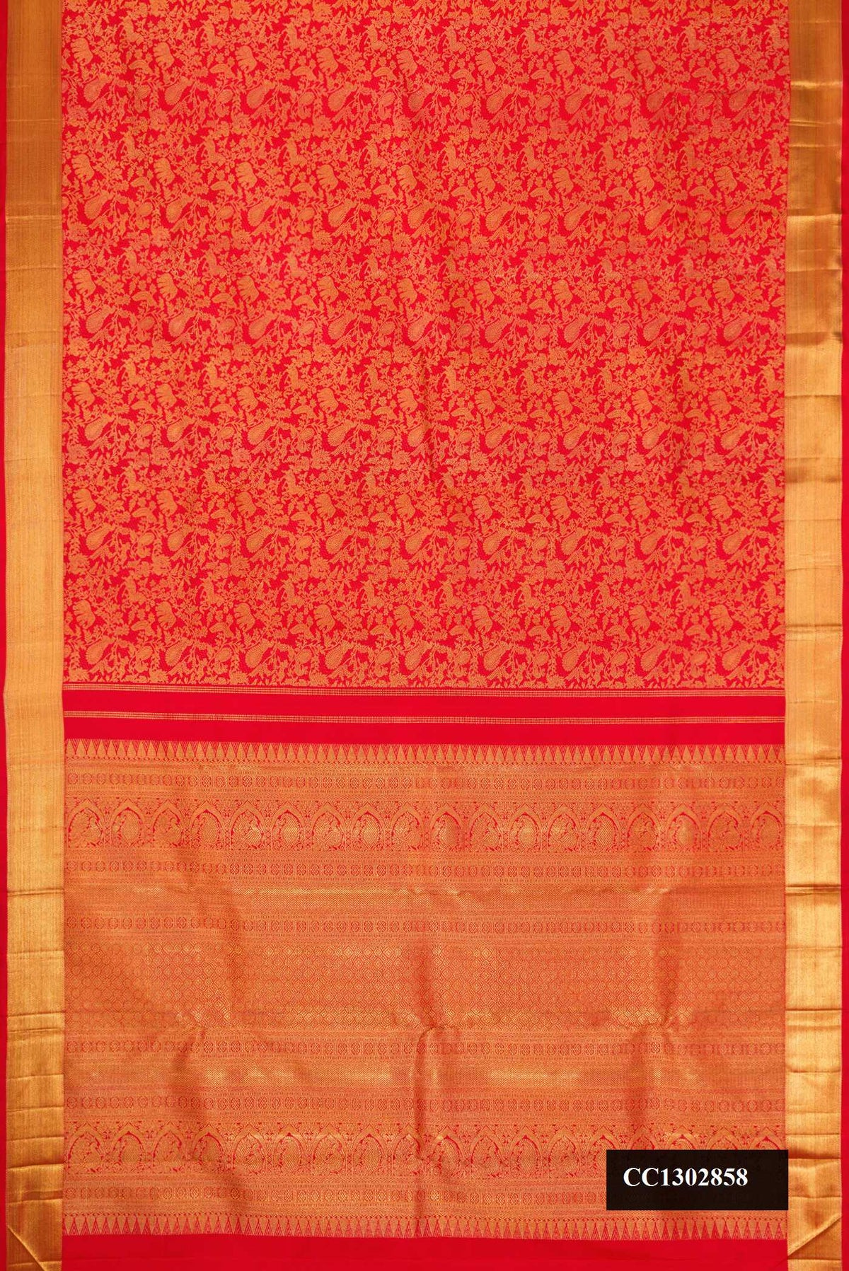 Red Dual Tone Kanchipuram Silk Saree with Zari Brocade on the body and Zari Border.  displayed on a mannequin