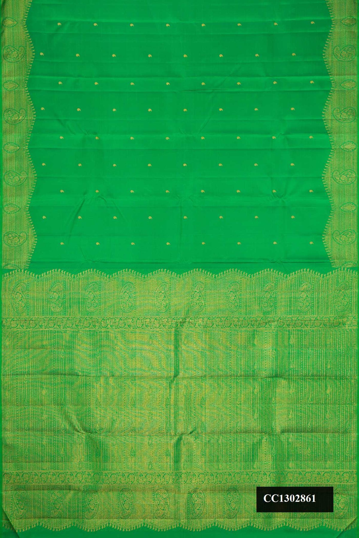 Green Dual Tone Kanchipuram Silk Saree with Zari Butta on the body and Fancy Border.  displayed on a mannequin