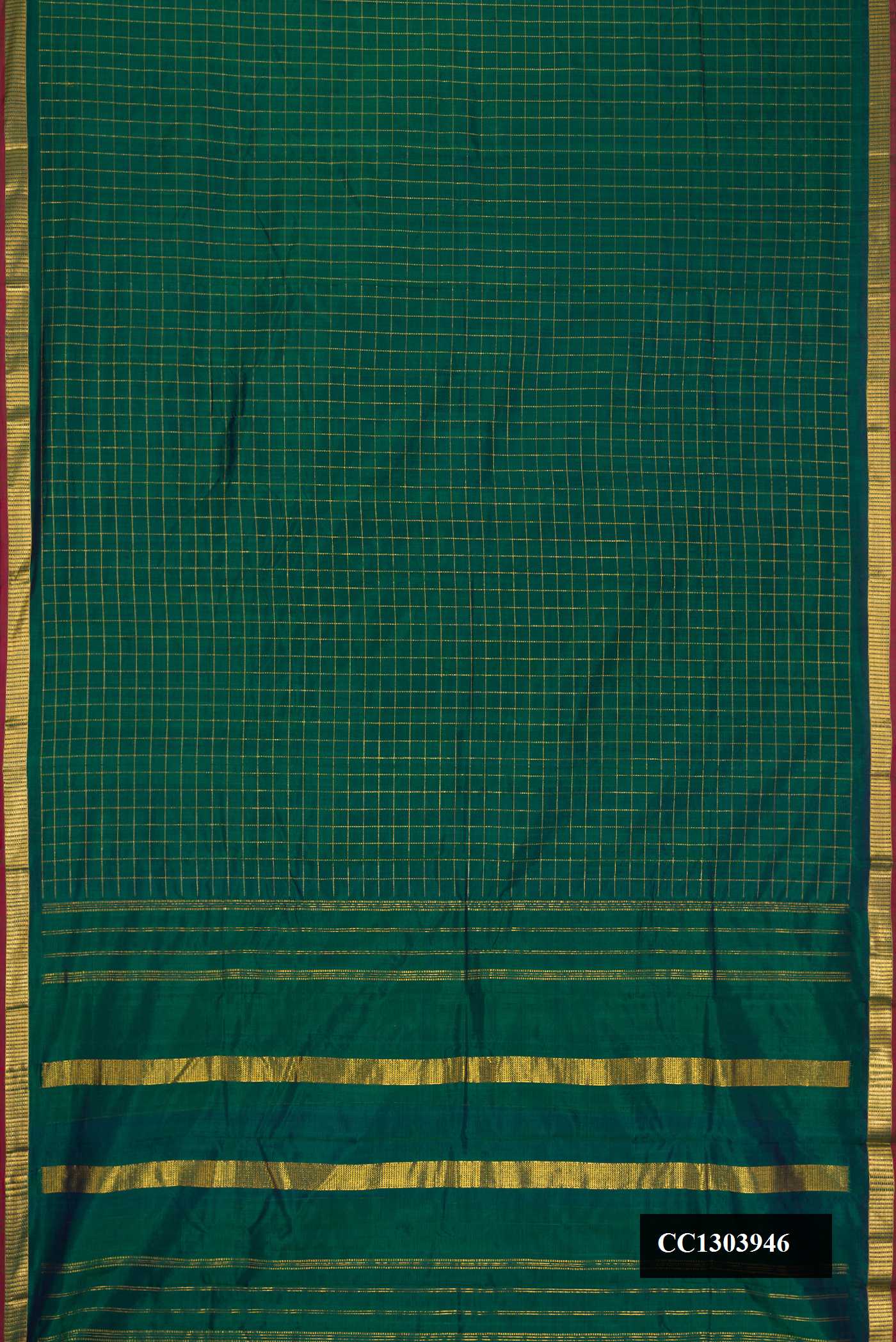 Bottle Green Dual Tone Kanchipuram Silk Saree with Checked design on the body and Zari Border.  displayed on a mannequin