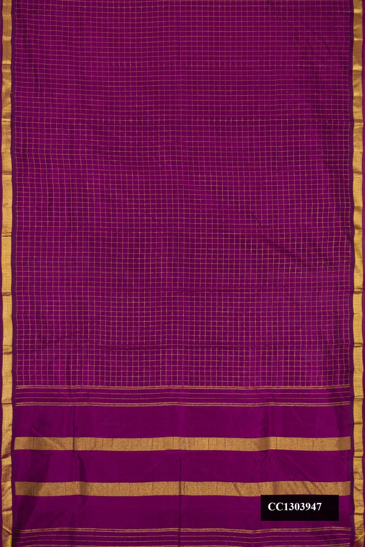 Purple Dual Tone Kanchipuram Silk Saree with Checked design on the body and Zari Border.  displayed on a mannequin