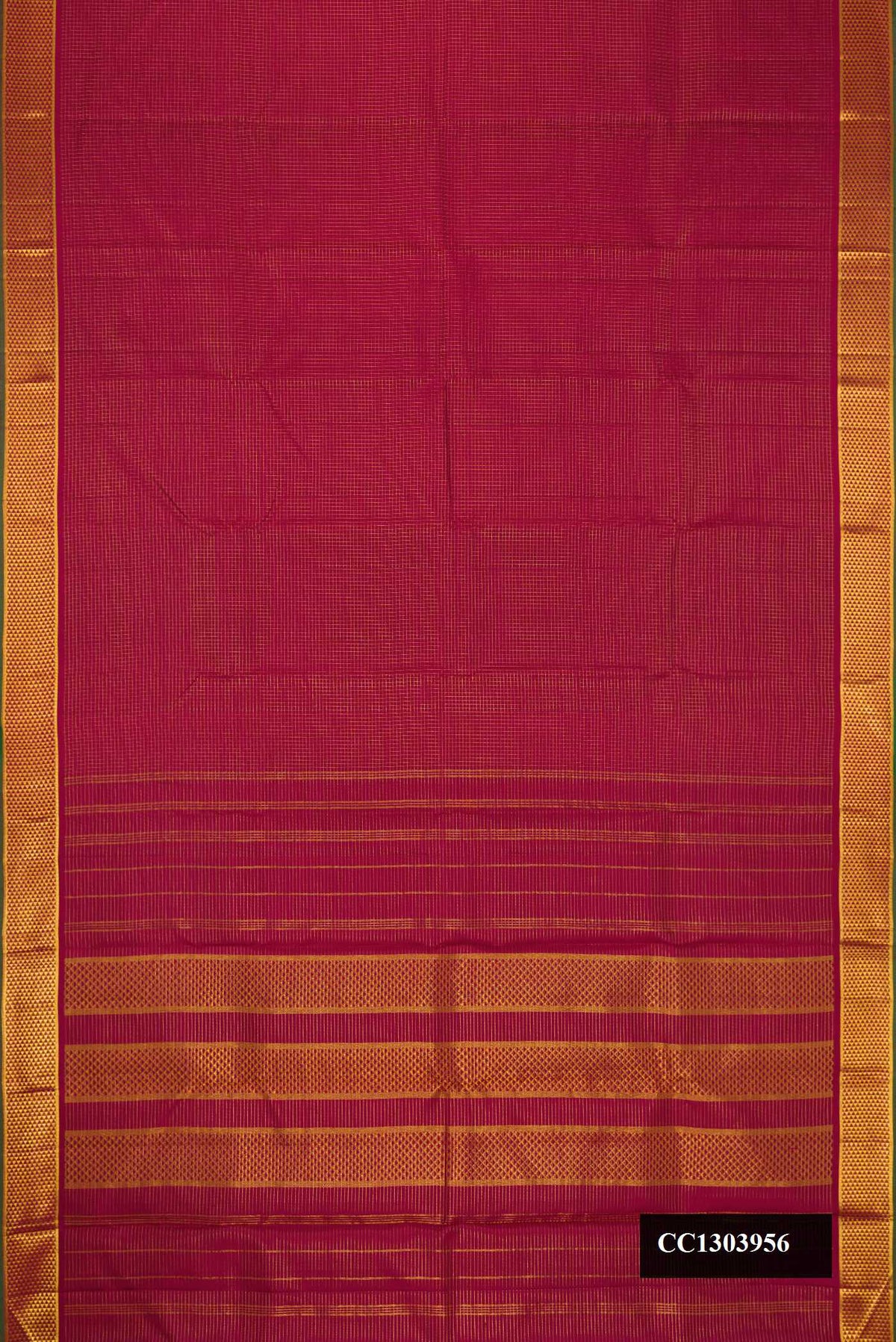 Maroon Dual Tone Kanchipuram Silk Saree with Checked design on the body and Zari Border.  displayed on a mannequin