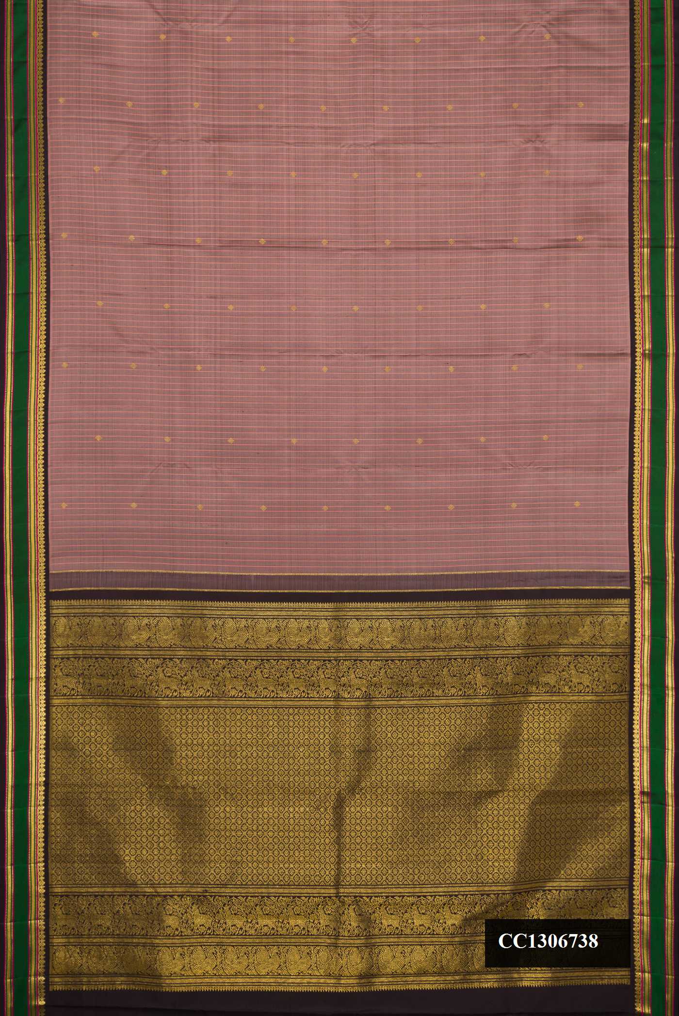 Brown Dual Tone Kanchipuram Silk Saree with Zari Butta on the body and Zari Border.  displayed on a mannequin