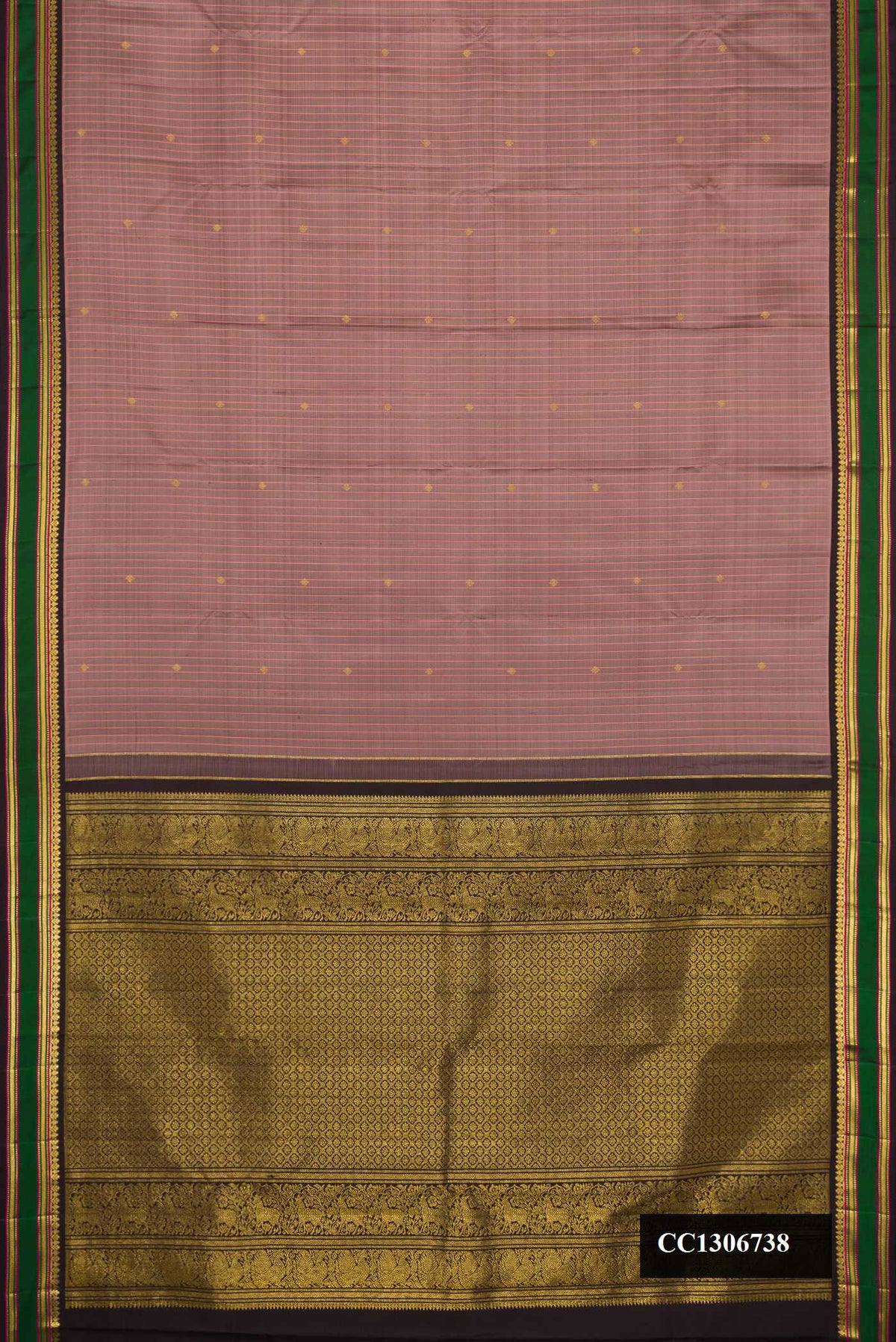 Brown Dual Tone Kanchipuram Silk Saree with Zari Butta on the body and Zari Border.  displayed on a mannequin