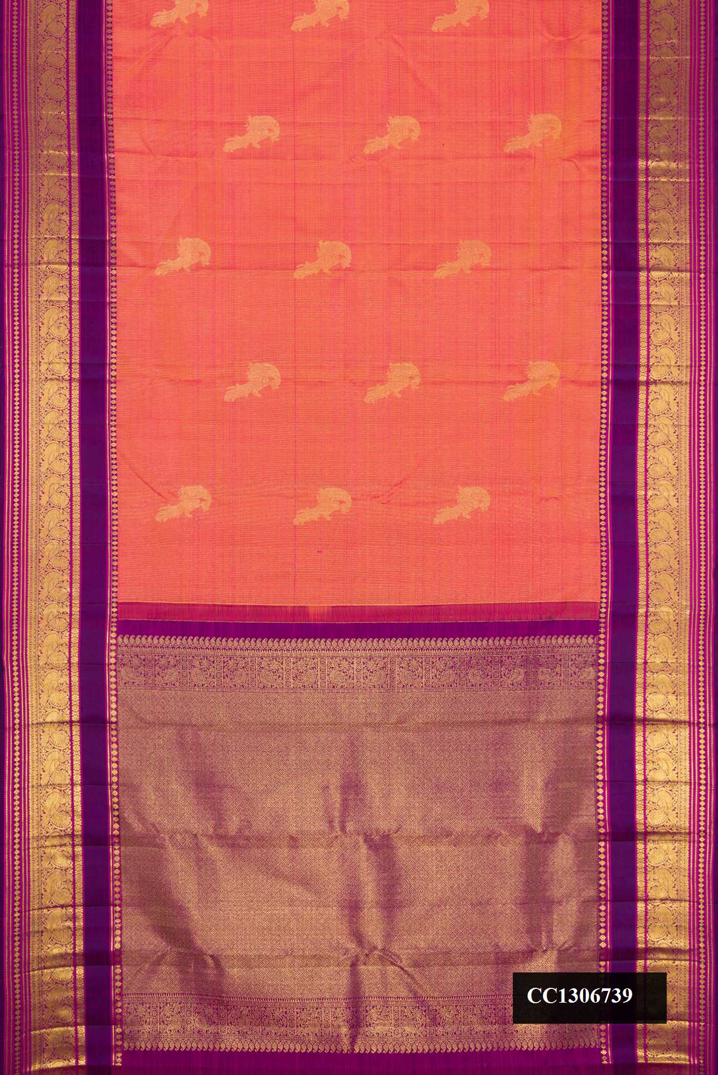 Coral Dual Tone Kanchipuram Silk Saree with Zari Butta on the body and Zari Border.  displayed on a mannequin