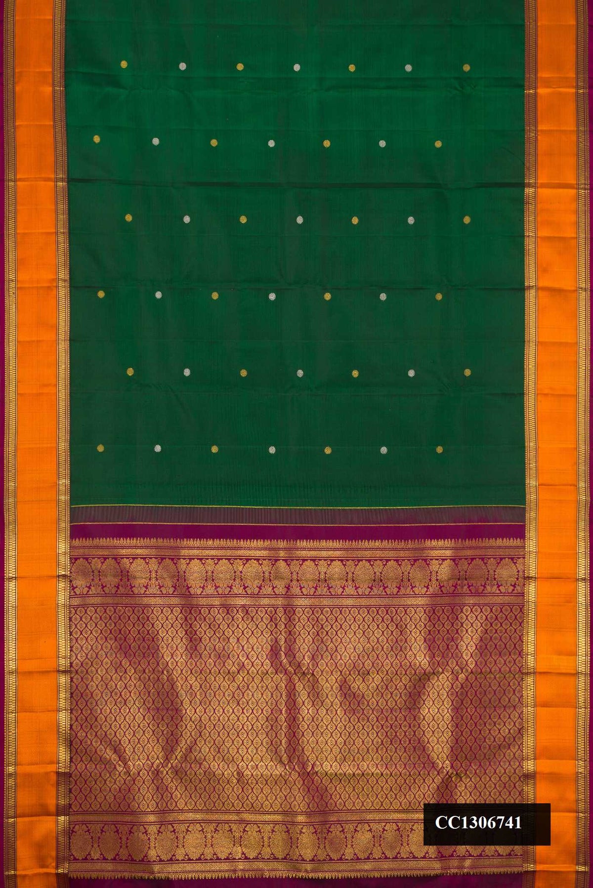 Bottle Green Dual Tone Kanchipuram Silk Saree with Zari Butta on the body and Zari And Thread Border.  displayed on a mannequin