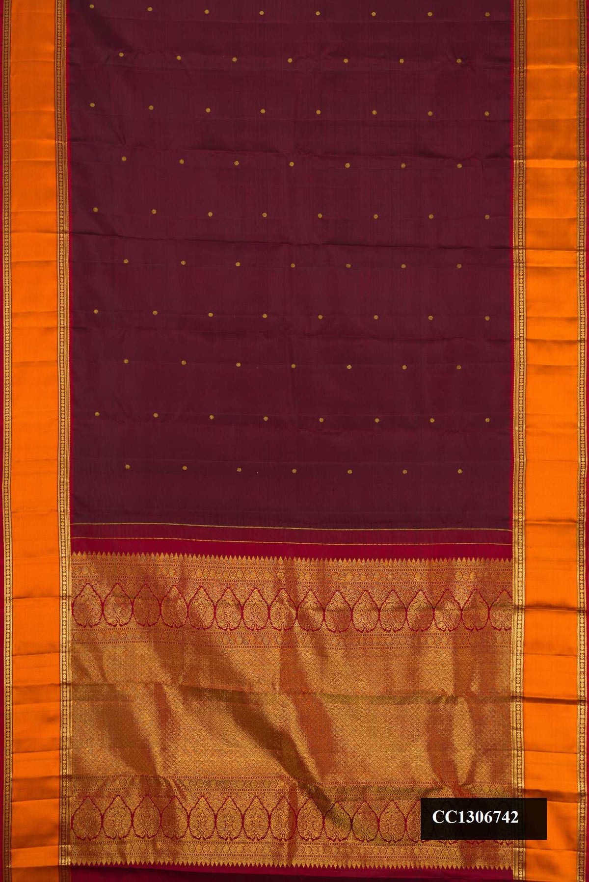 Coffee Brown Dual Tone Kanchipuram Silk Saree with Zari Butta on the body and Zari And Thread Border.  displayed on a mannequin