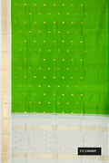 Parrot Green Dual Tone Kanchipuram Silk Saree with Zari Butta on the body and One Side Border.  displayed on a mannequin