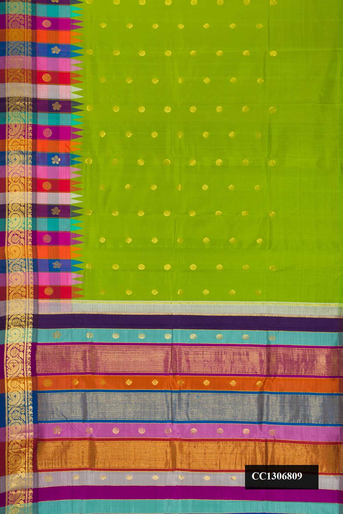 Parrot Green Dual Tone Kanchipuram Silk Saree with Zari Butta on the body and One Side Border.  displayed on a mannequin