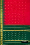 Red Dual Tone Kanchipuram Silk Saree with Zari Butta on the body and One Side Border.  displayed on a mannequin