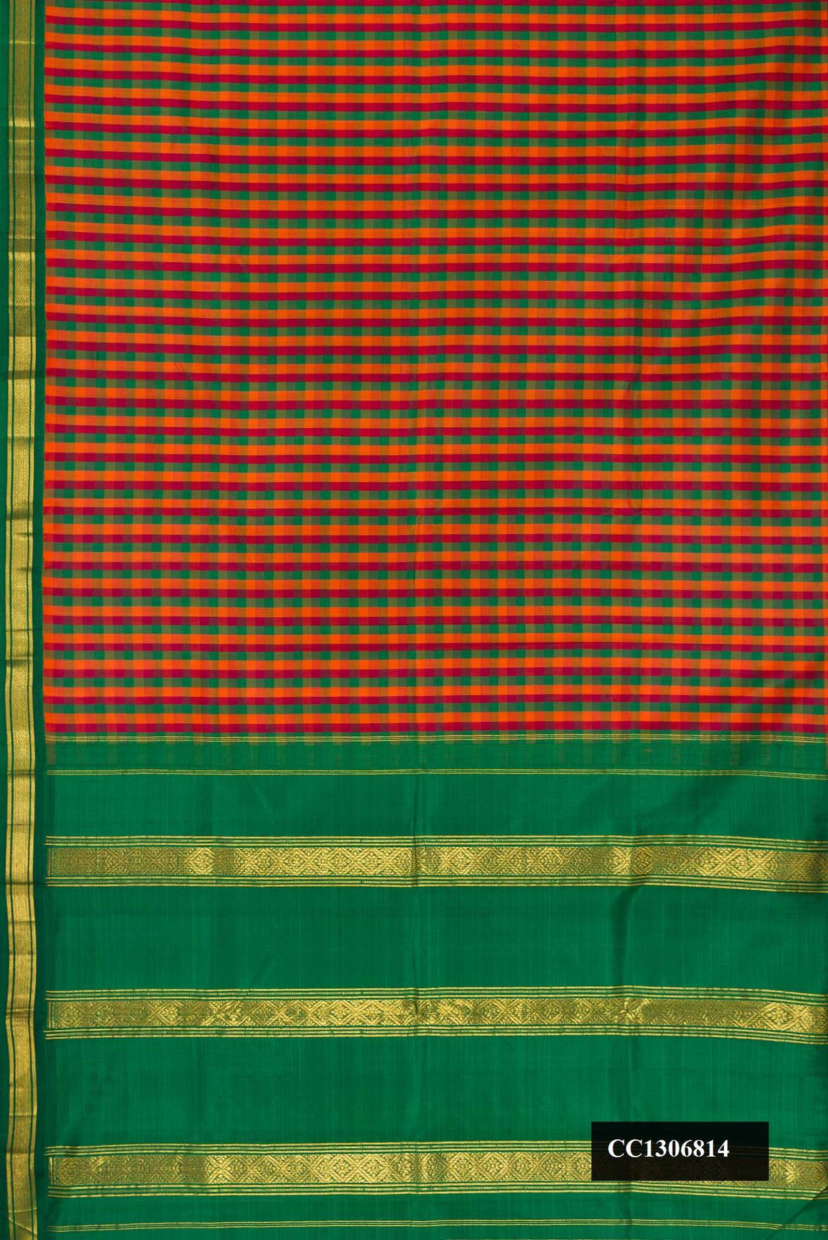 Orange, Green and Maroon Dual Tone Kanchipuram Silk Saree with Zari Butta on the body and One Side Border.  displayed on a mannequin
