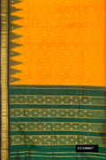 Yellow Dual Tone Kanchipuram Silk Saree with Zari Butta on the body and One Side Border.  displayed on a mannequin