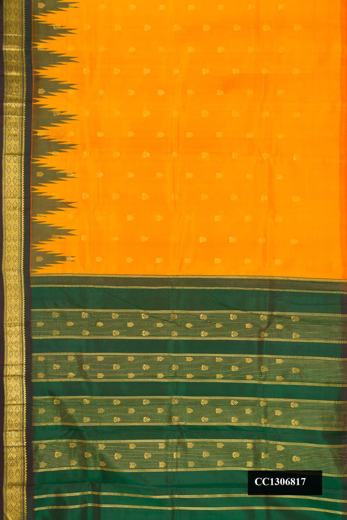 Yellow Dual Tone Kanchipuram Silk Saree with Zari Butta on the body and One Side Border.  displayed on a mannequin