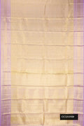 Beige Dual Tone Kanchipuram Tissue Silk Saree with Zari Brocade on the body and Zari Border.  displayed on a mannequin