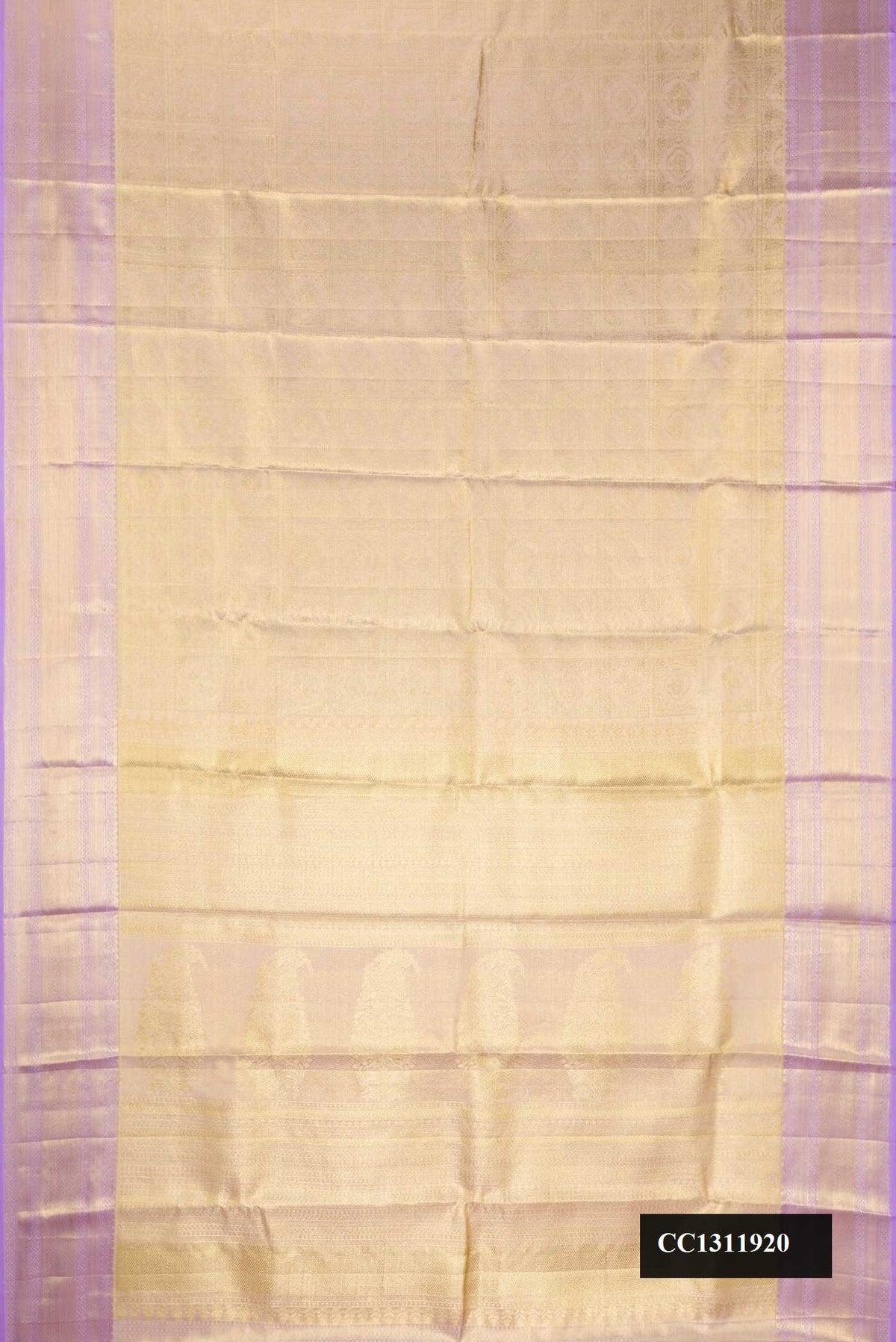 Beige Dual Tone Kanchipuram Tissue Silk Saree with Zari Brocade on the body and Zari Border.  displayed on a mannequin
