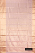 Rose Gold Dual Tone Kanchipuram Tissue Silk Saree with Zari Brocade on the body and Zari Border.  displayed on a mannequin