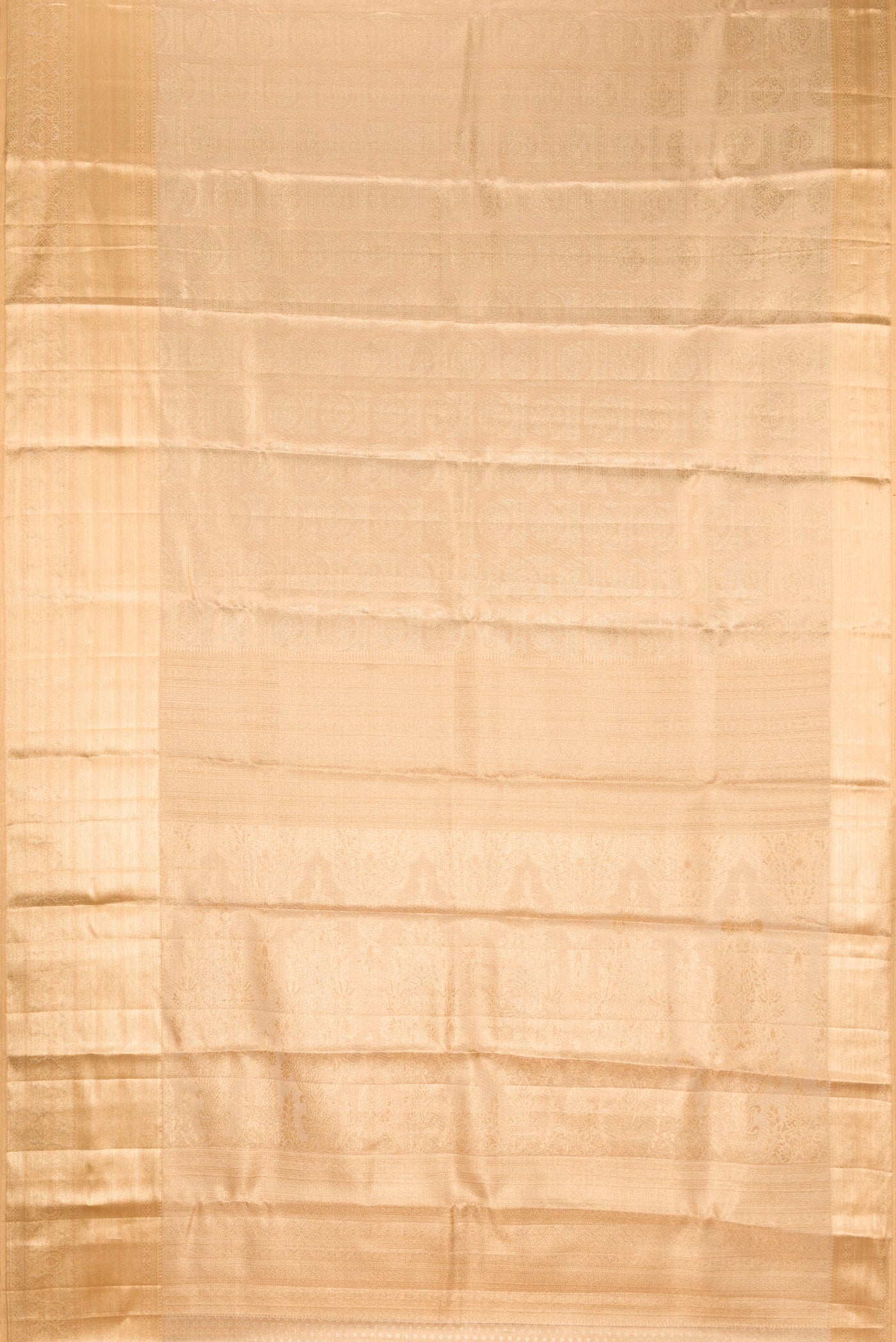 Gold Dual Tone Kanchipuram Tissue Silk Saree with Zari Brocade on the body and Fancy Border.  displayed on a mannequin
