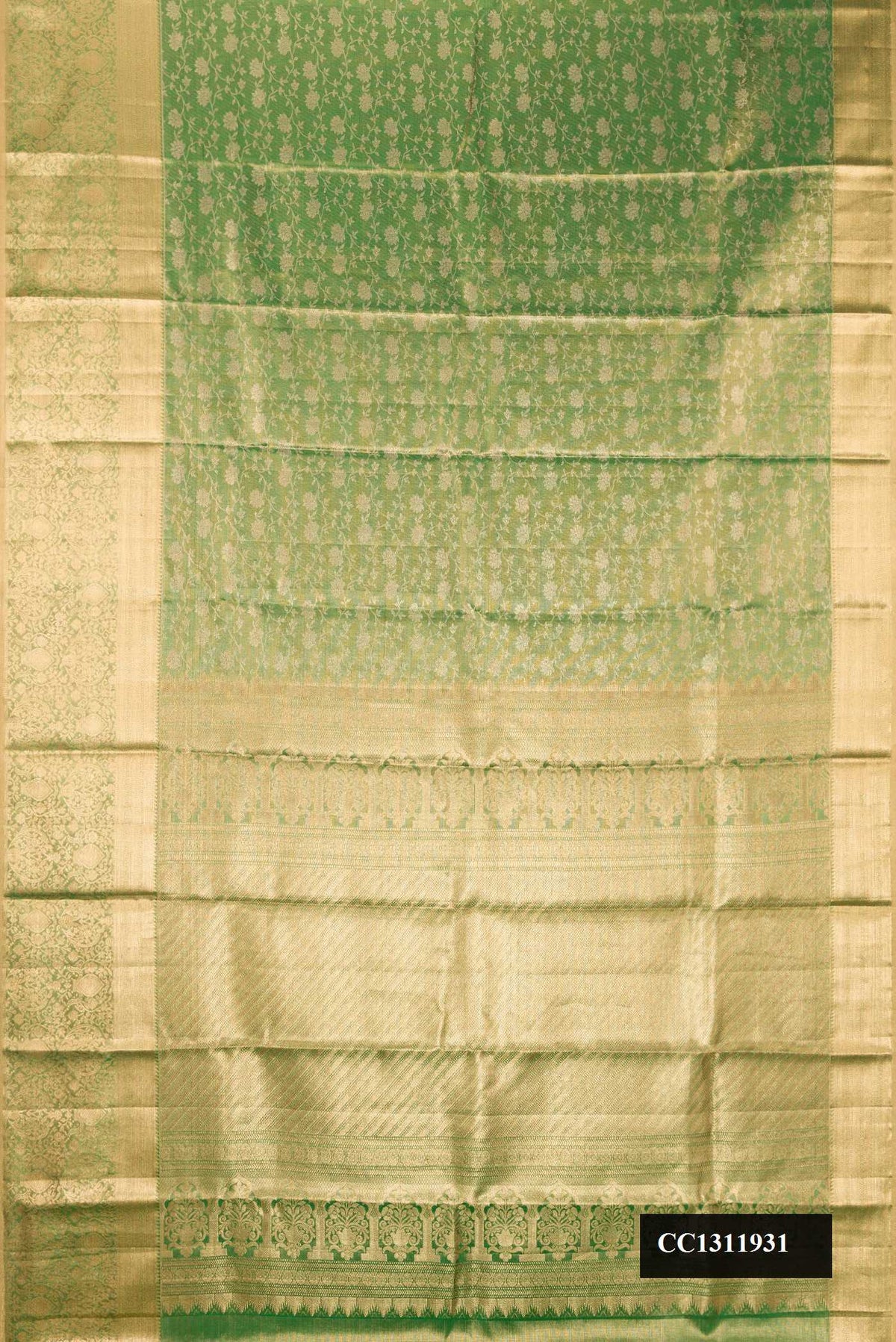 Green Dual Tone Kanchipuram Tissue Silk Saree with Zari Brocade on the body and Zari Border.  displayed on a mannequin