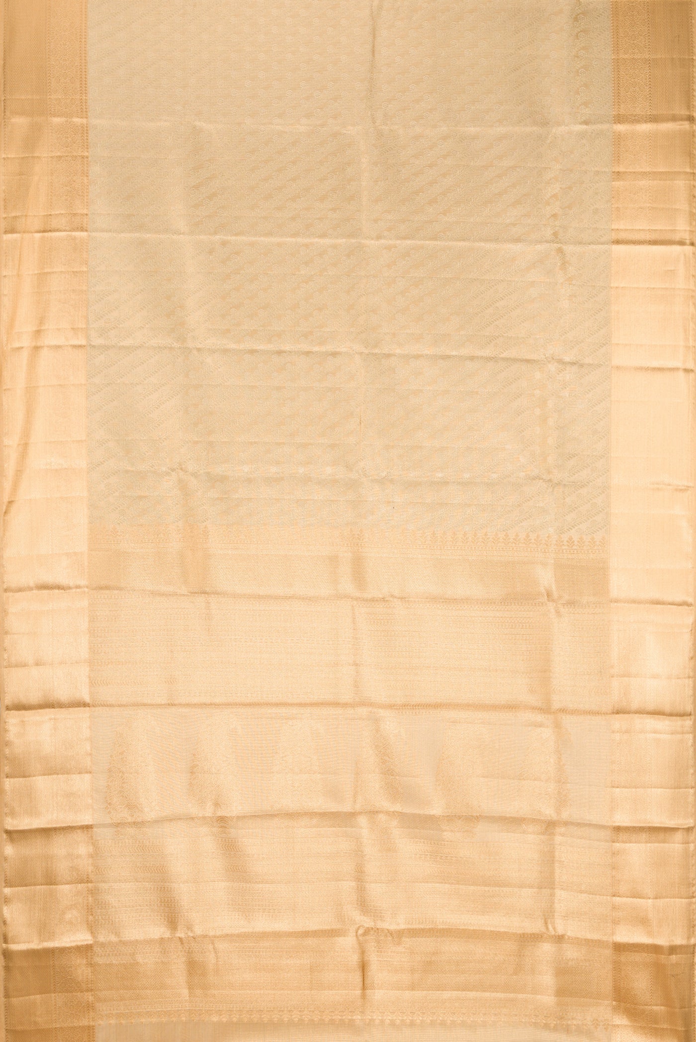 Gold Dual Tone Kanchipuram Tissue Silk Saree with Zari Brocade on the body and Fancy Border.  displayed on a mannequin