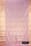Lavender Dual Tone Kanchipuram Tissue Silk Saree with Zari Brocade on the body and Zari Border.  displayed on a mannequin