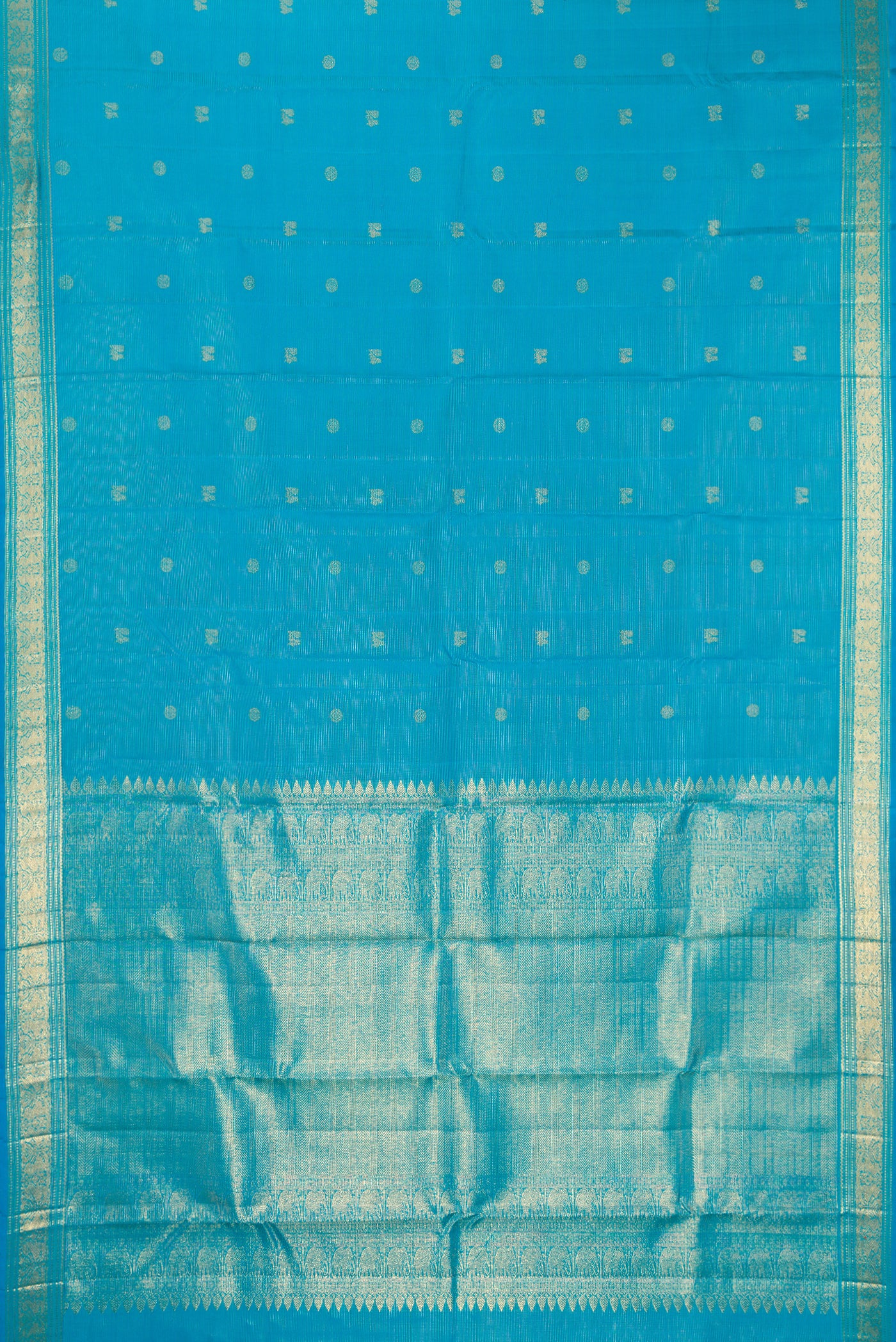 Sky Blue Dual Tone Kanchipuram Silk Saree with Stripes on the body and Zari Border.  displayed on a mannequin
