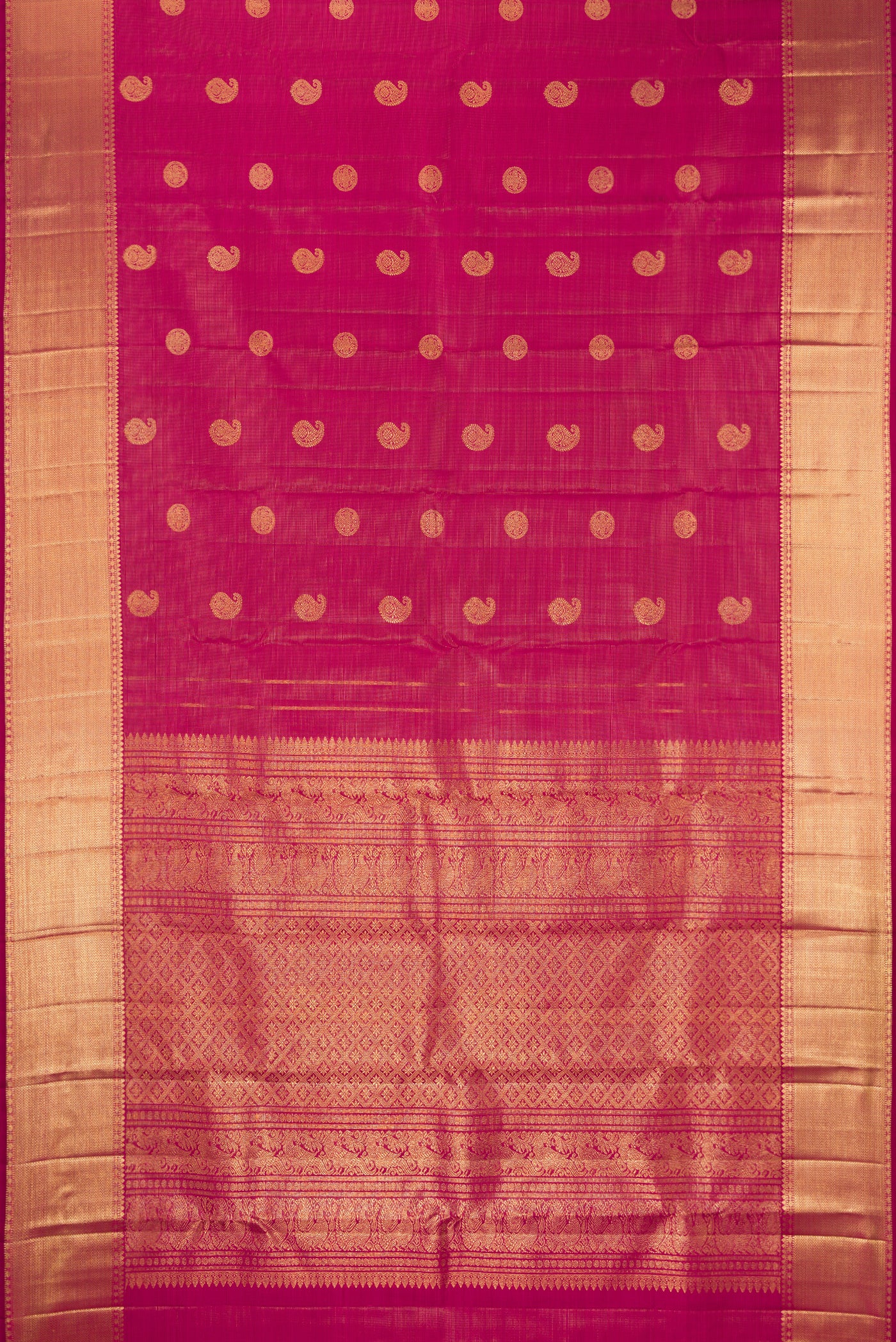 Dark Pink Dual Tone Kanchipuram Silk Saree with Stripes on the body and Zari Border.  displayed on a mannequin