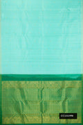 Light Blue Dual Tone Kanchipuram Silk Saree with Zari Butta on the body and Zari Border.  displayed on a mannequin