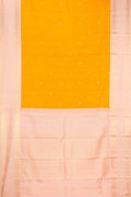 Mustard Dual Tone Kanchipuram Silk Saree with Zari Butta on the body and Fancy Border.  displayed on a mannequin