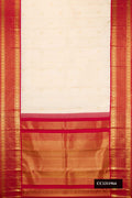 Off White Dual Tone Kanchipuram Silk Saree with Zari Butta on the body and Zari Border.  displayed on a mannequin