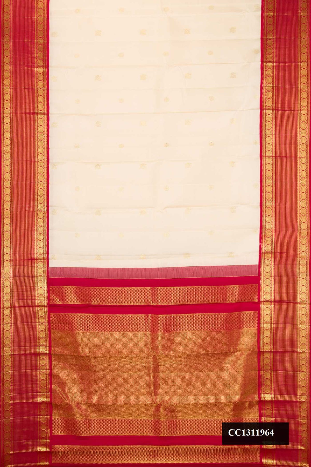Off White Dual Tone Kanchipuram Silk Saree with Zari Butta on the body and Zari Border.  displayed on a mannequin