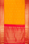 Mustard Dual Tone Kanchipuram Silk Saree with Zari Butta on the body and Fancy Border.  displayed on a mannequin