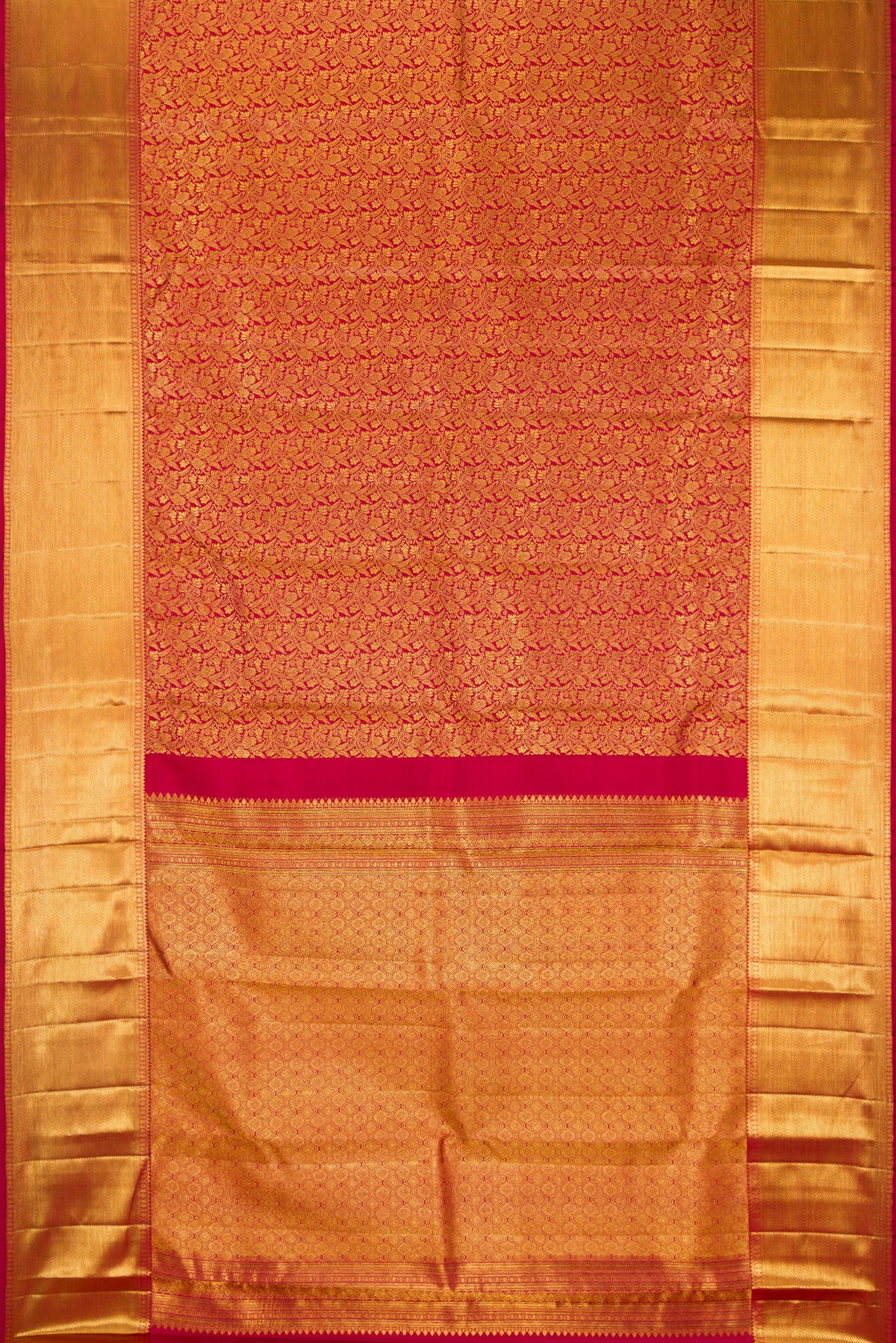 Maroon Dual Tone Kanchipuram Silk Saree with Zari Brocade on the body and Zari Border.  displayed on a mannequin