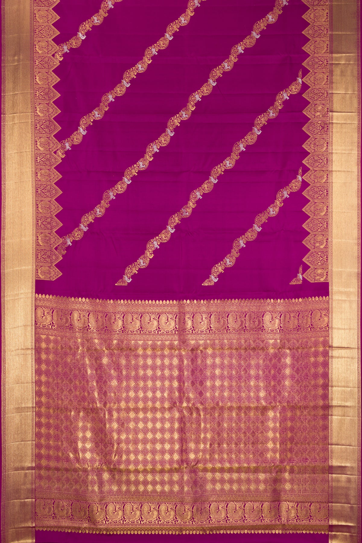 Purple Dual Tone Kanchipuram Silk Saree with Stripes on the body and Fancy Border.  displayed on a mannequin