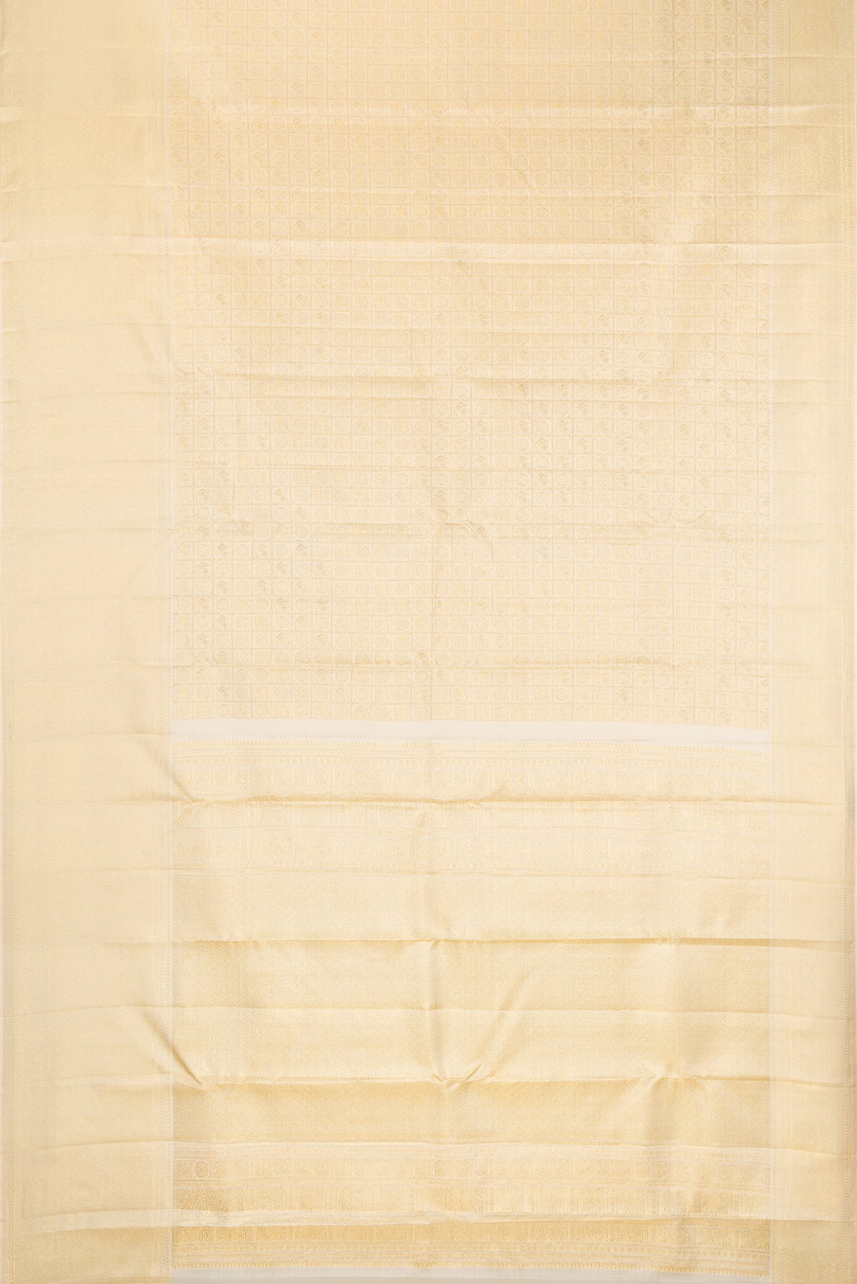 Beige Dual Tone Kanchipuram Silk Saree with Zari Brocade on the body and Zari Border.  displayed on a mannequin
